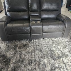 Gray Leather Recliner And Swivel Loveseat