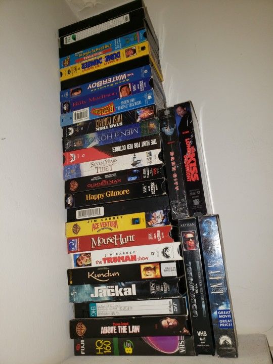 VHS Movies Saint Above The Law Terminator Jackal Kundun Ace Ventura Seven Years In Tibet The Hunt For Red October Star Trek Dumb And Dumber
