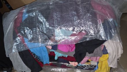 1 bundle of shirts 2 bins of sweats