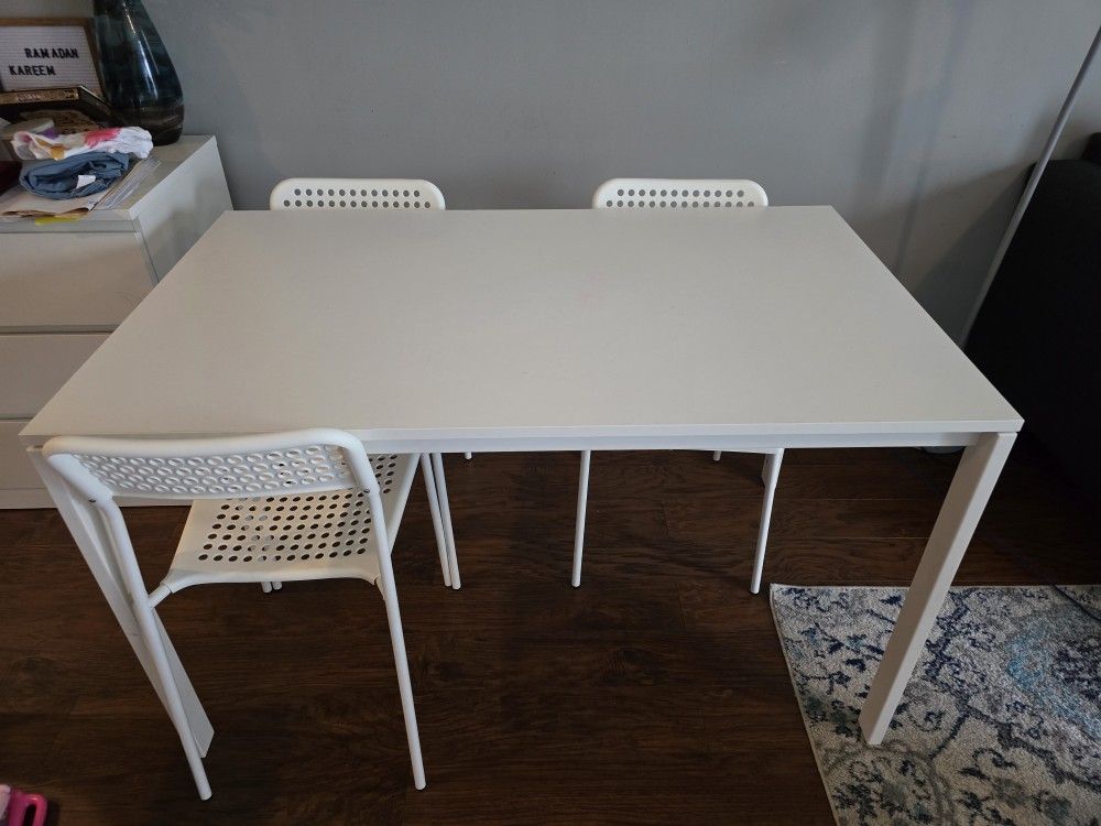 Dining table and three chairs from IKEA