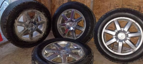 Cadillac rims 5 lug crome all center caps
