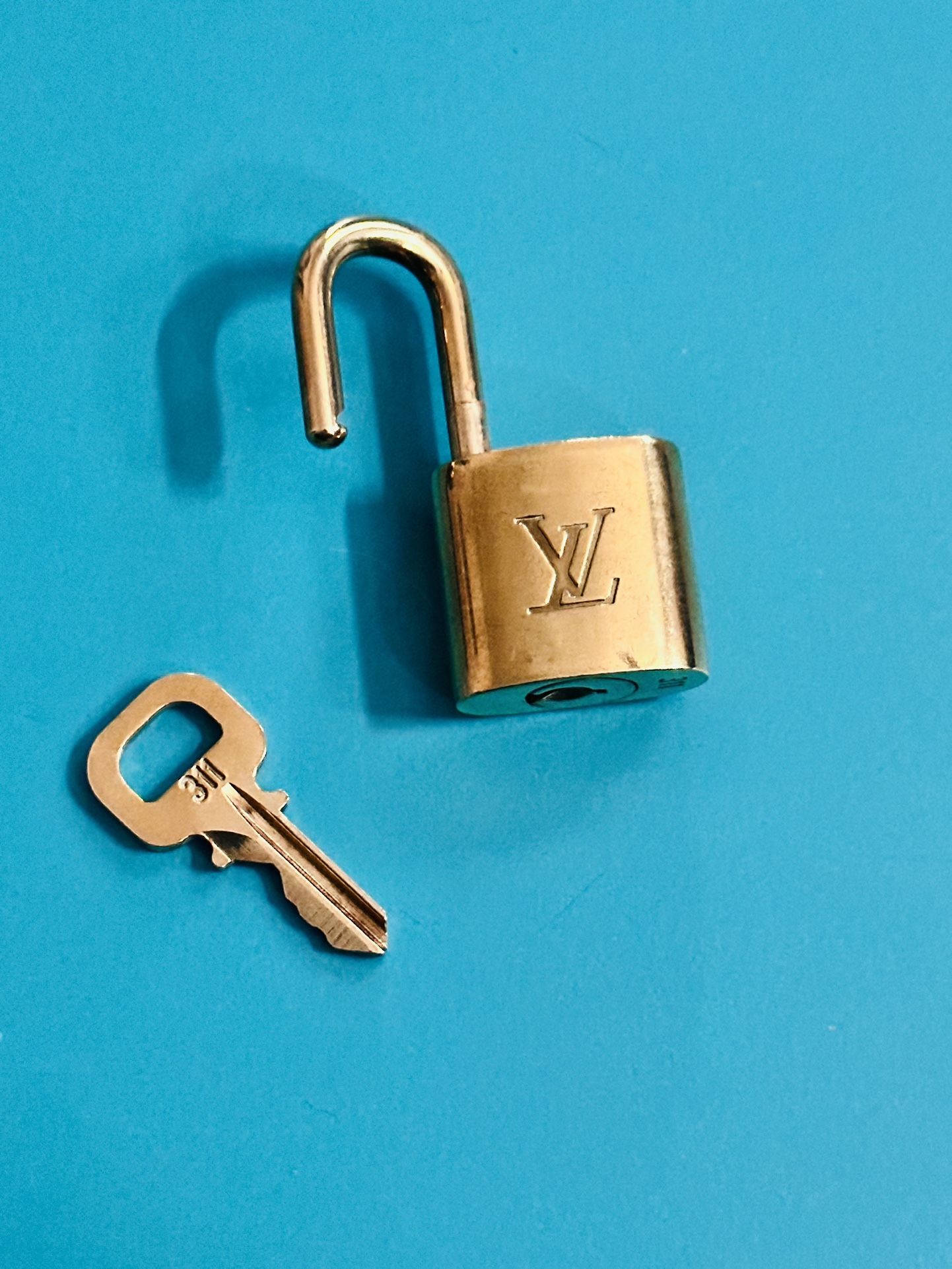 $85/OBO L V Lock & Key,  #311 Matching Gold Heavy Solid Authentic Set. Use For Your Bag Or Pair With A Chain For Necklace! 