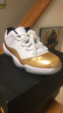 Gold and white Jordan 11’s low size 10 men’s