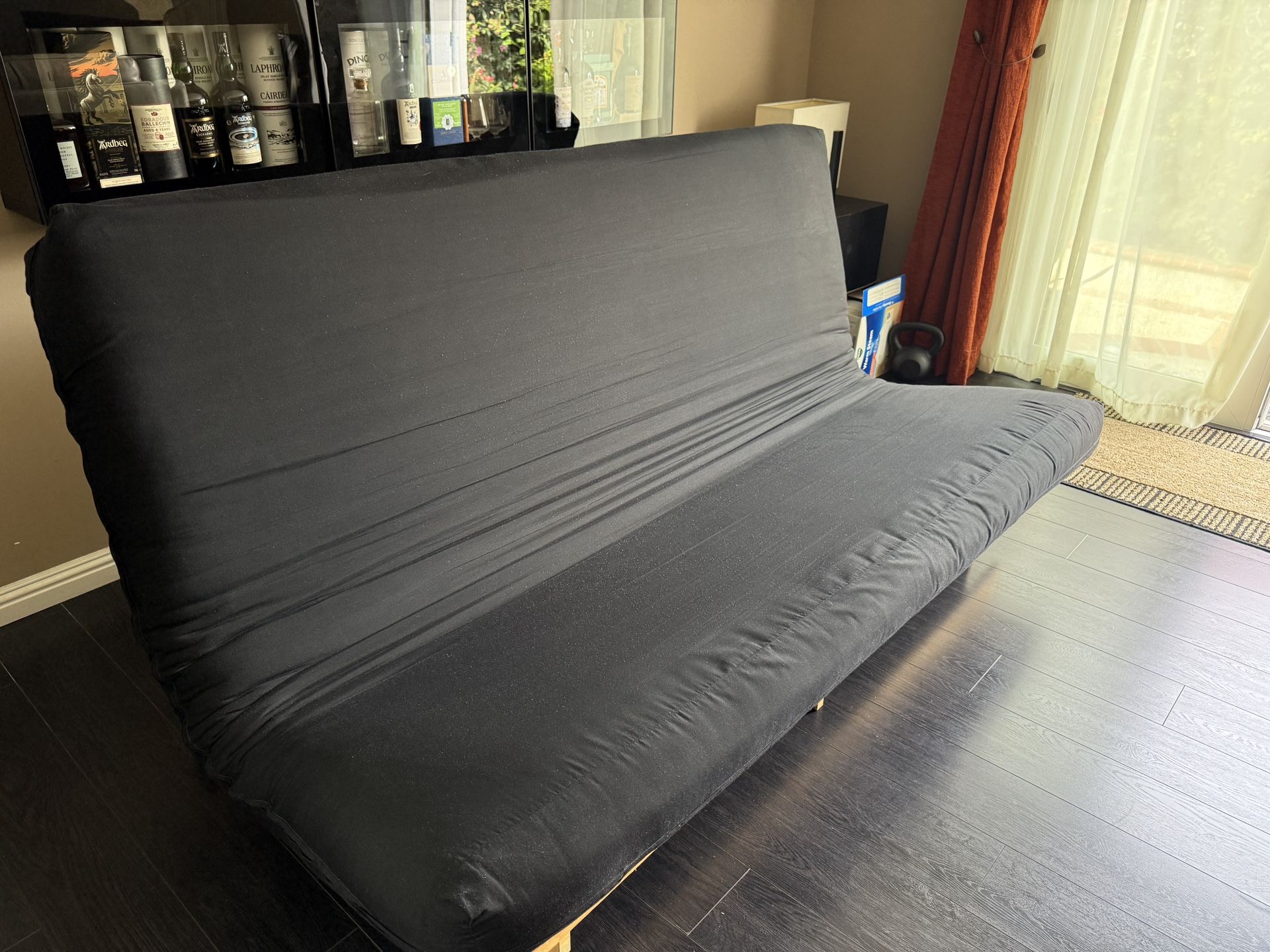 IKEA Wood Frame Futon . Name Your Price.