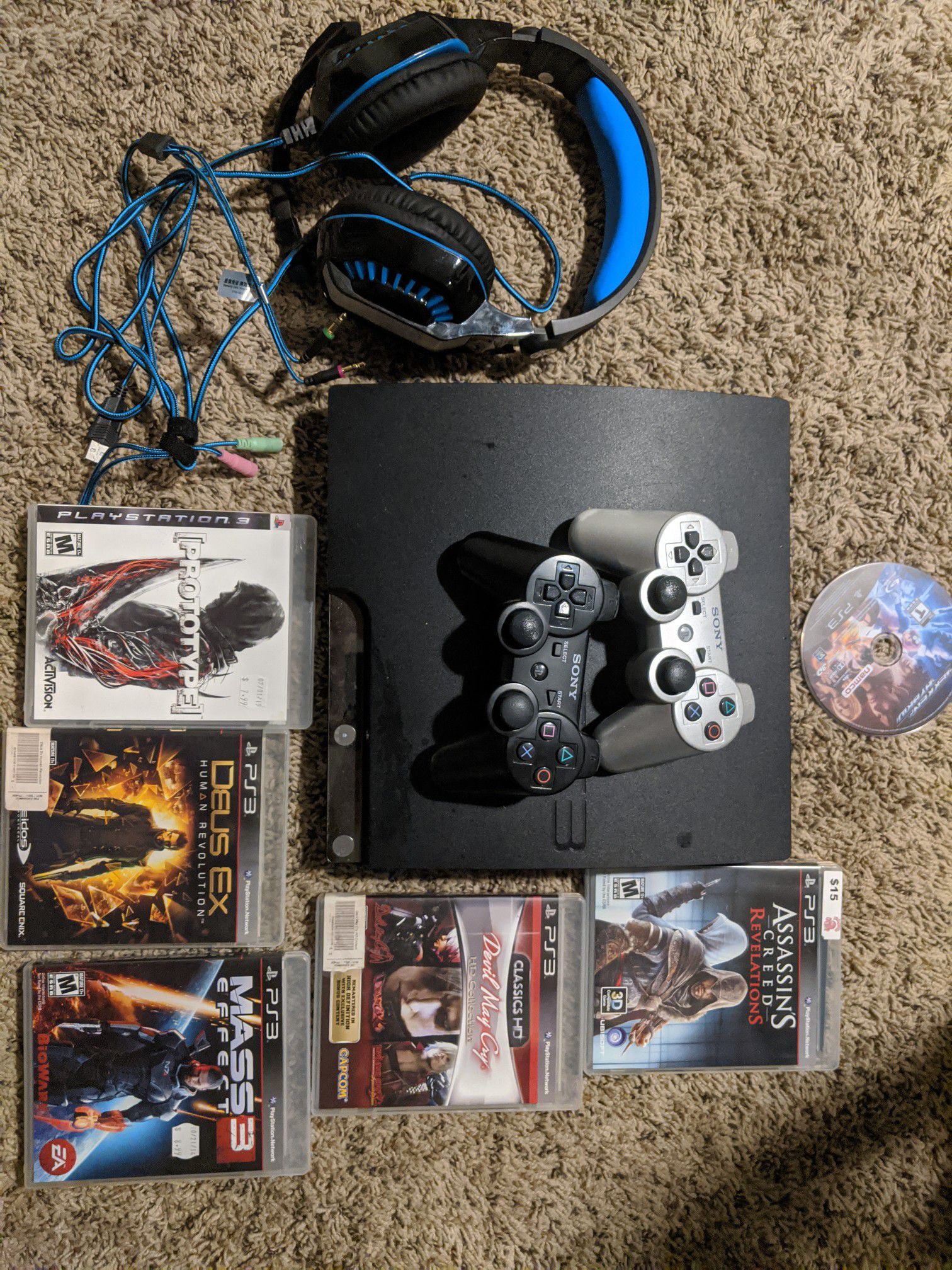 PS3 with 2 controllers and Games