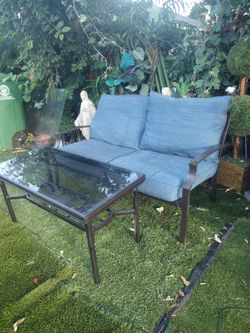 Sillón de jardín con mesita