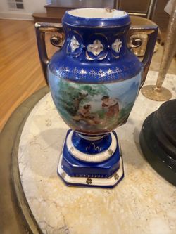 This is Erphila Art Pottery, Czecho-Slovakia, an older Czech decorative porcelain/pottery piece. Erphila was a mark associated with Ebeling & Reuss im