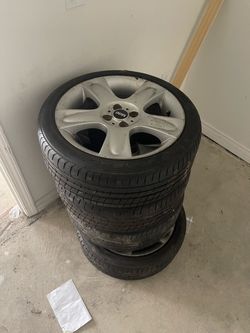 4 mini cooper wheels with like new tires