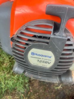 2 mowers a weedeater and blower