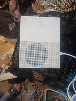 Xbox One s with cords and controller