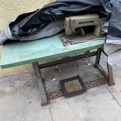 Old Fashion Sewing Machine And Table