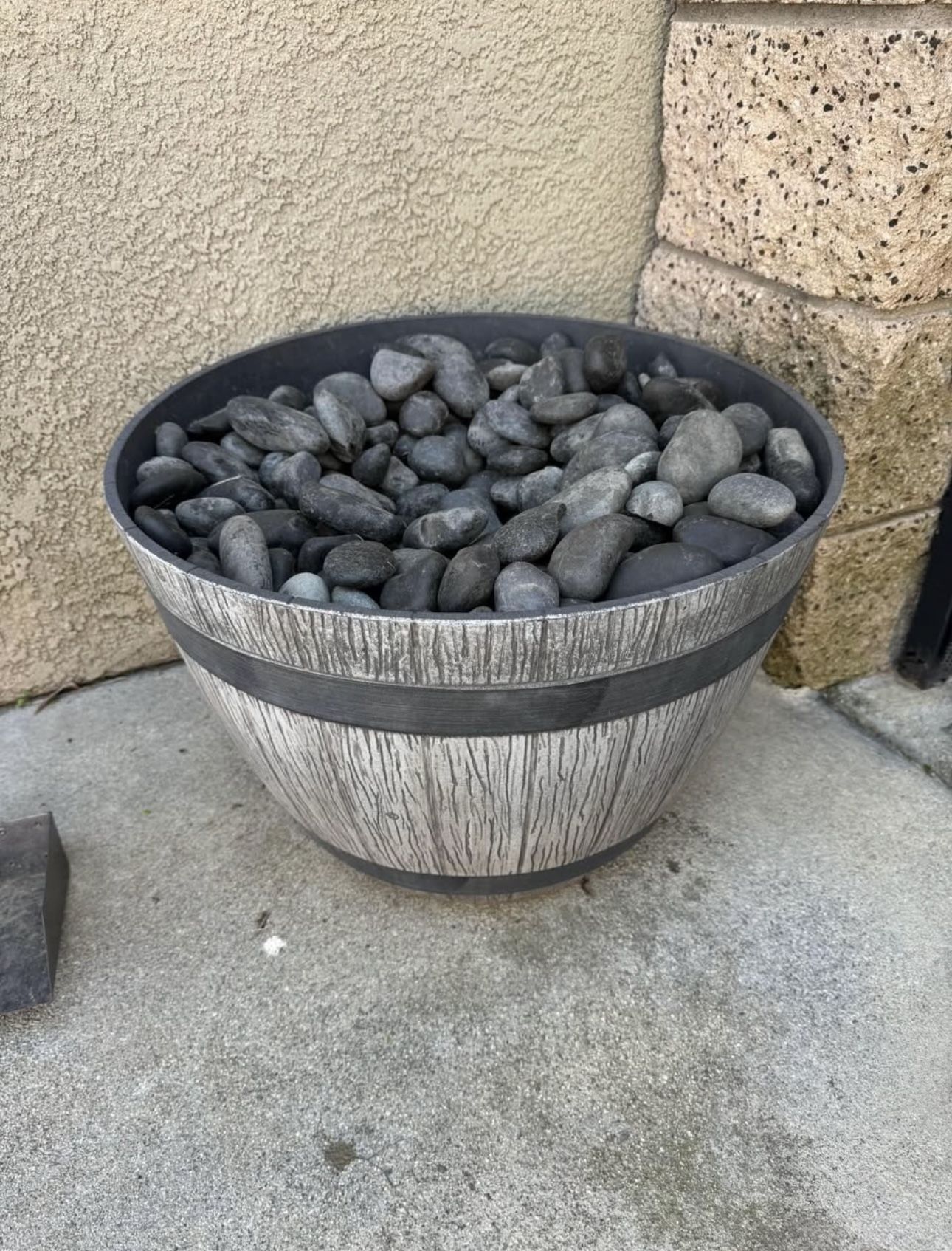 Flower Pot And Rocks