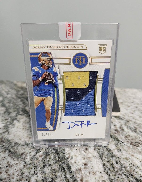 2023 Sealed National Treasures Dorian Thompson-Robinson GOLD Three-color RPA /10 Cleveland Browns