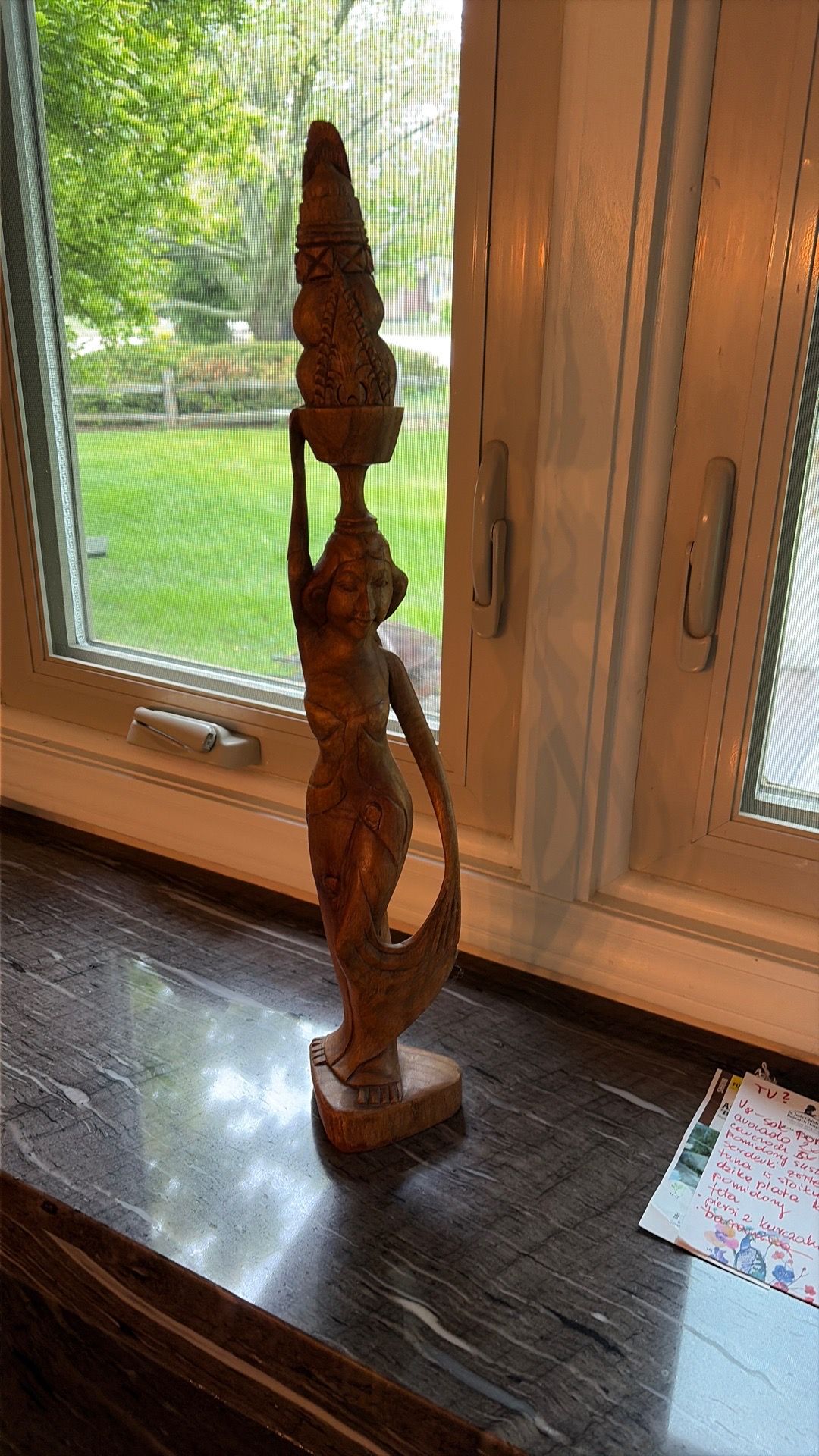 Wood sculpture lady