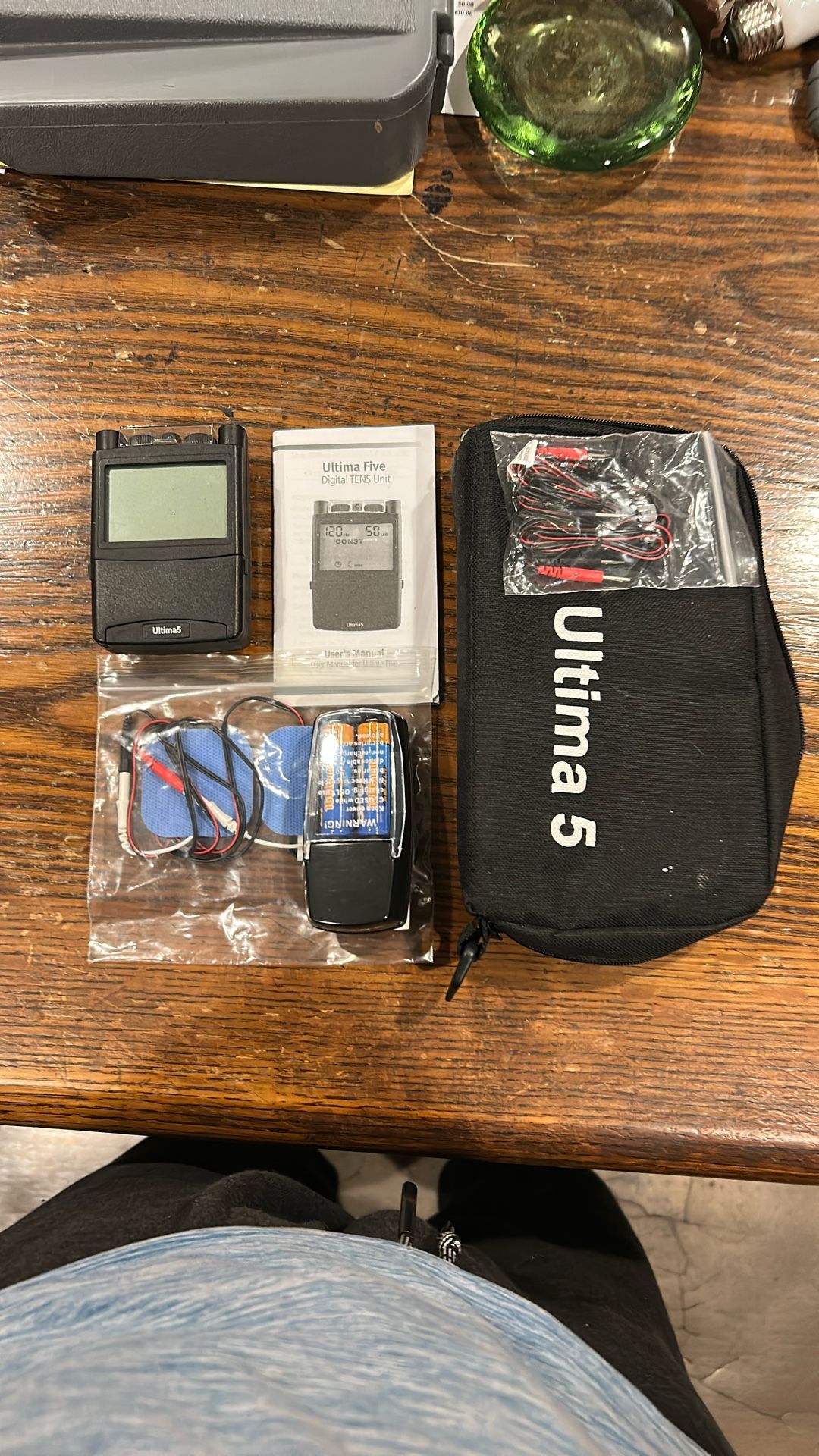 TENS Unit. Electrical stimulation of nerves in local areas for pain management.