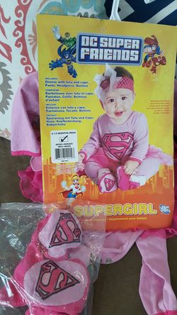 Size 6-12 m costume super girl. ( no headband) but does come with booties.