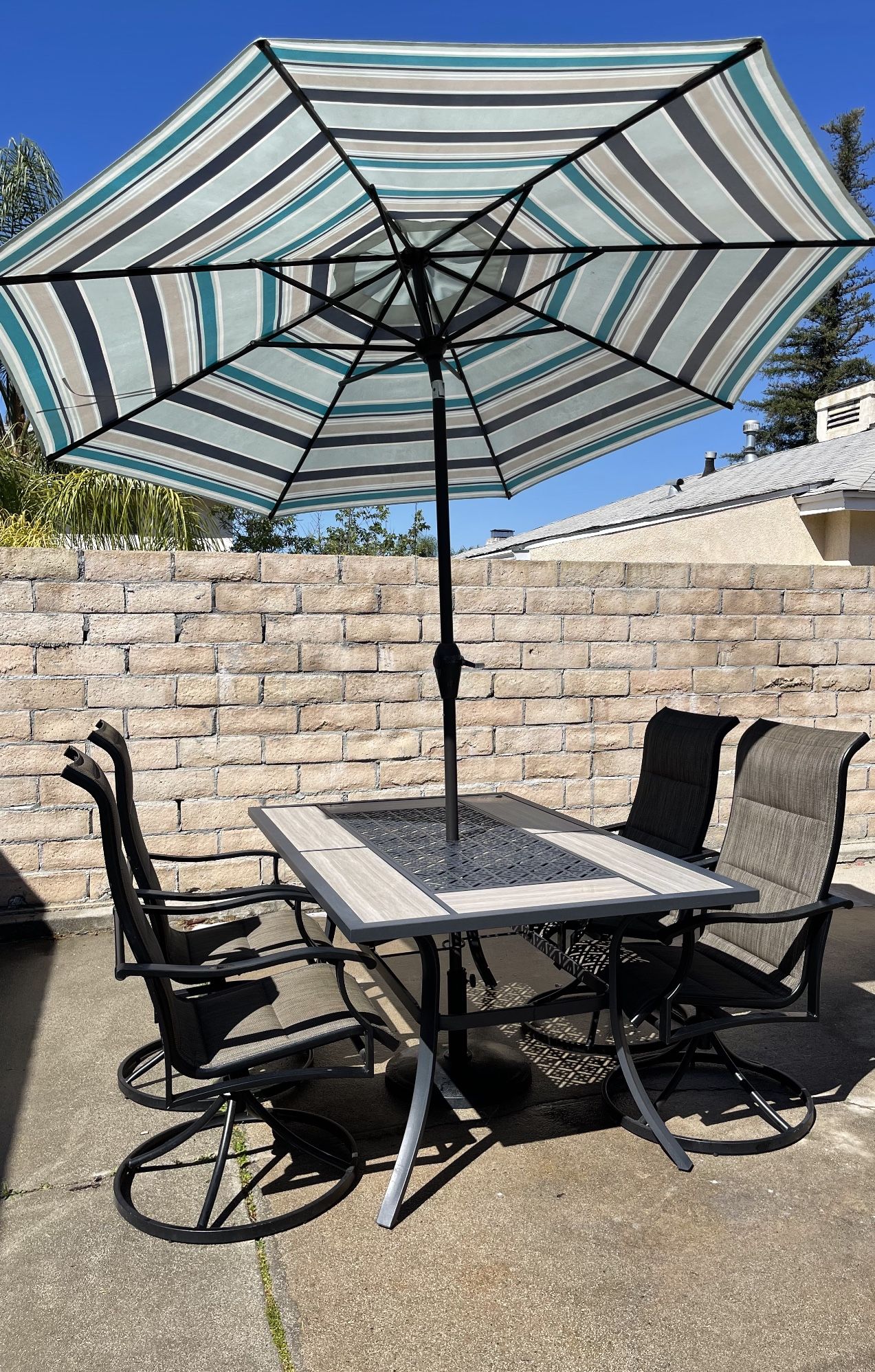 Elliot Creek Dining Table • Sling Swivel Chairs •Umbrella & Stand