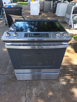 Ge slide in  range 30 day warranty  30 dias de garantia