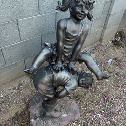 2 girls playing GARDEN DECOR