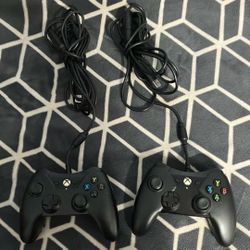 2 Xbox One Black Wired Controllers. Open to trades