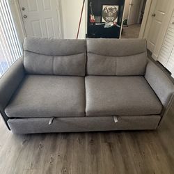 Gray sleeper couch
