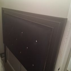 Black Mounted Queen Sized Bed. 