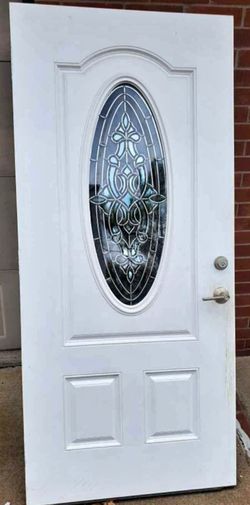 White exterior Door with Oval Glass Insert