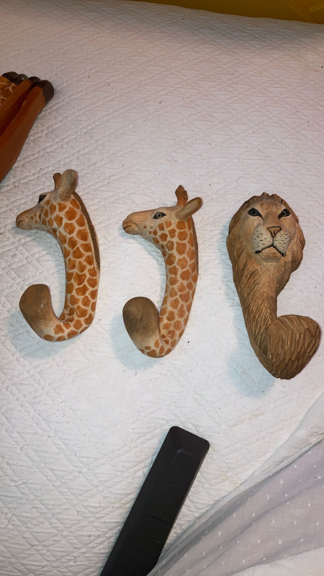 Giraffe and lion hook