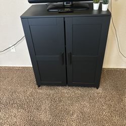 2 black cabniet dressers