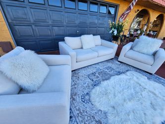 Beautiful living room set totally Deep Clean Good Condition Couch and 2 chairs white color made Fabric No Stains No Smell