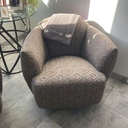 2 Swivel/Rocking accent Chairs