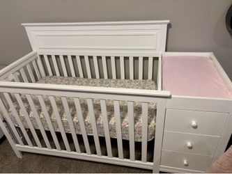White crib with mattress