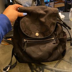 black coach backpack