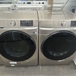 SAMSUNG  4.5 cu.ft High-Efficiency front load washer & 7.5 cu.ft stackable vented gas dryer