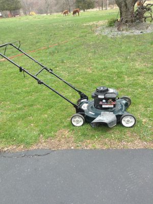 Photo Bolens 22 cut push mower with discharge chute is not a self propelled just a push mower only pickup only no meet no deilvery