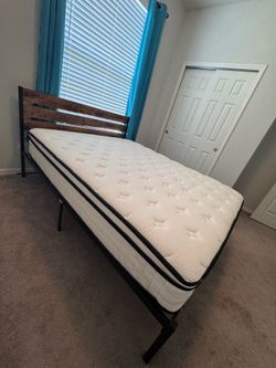 Full-size bed with mattress
