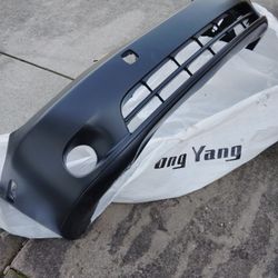 Front Replacement Bumper Cover for a 2005 Lexus ES330 w/Wheel Liners