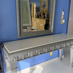 Silver console table with a white Marble top and a matching mirror