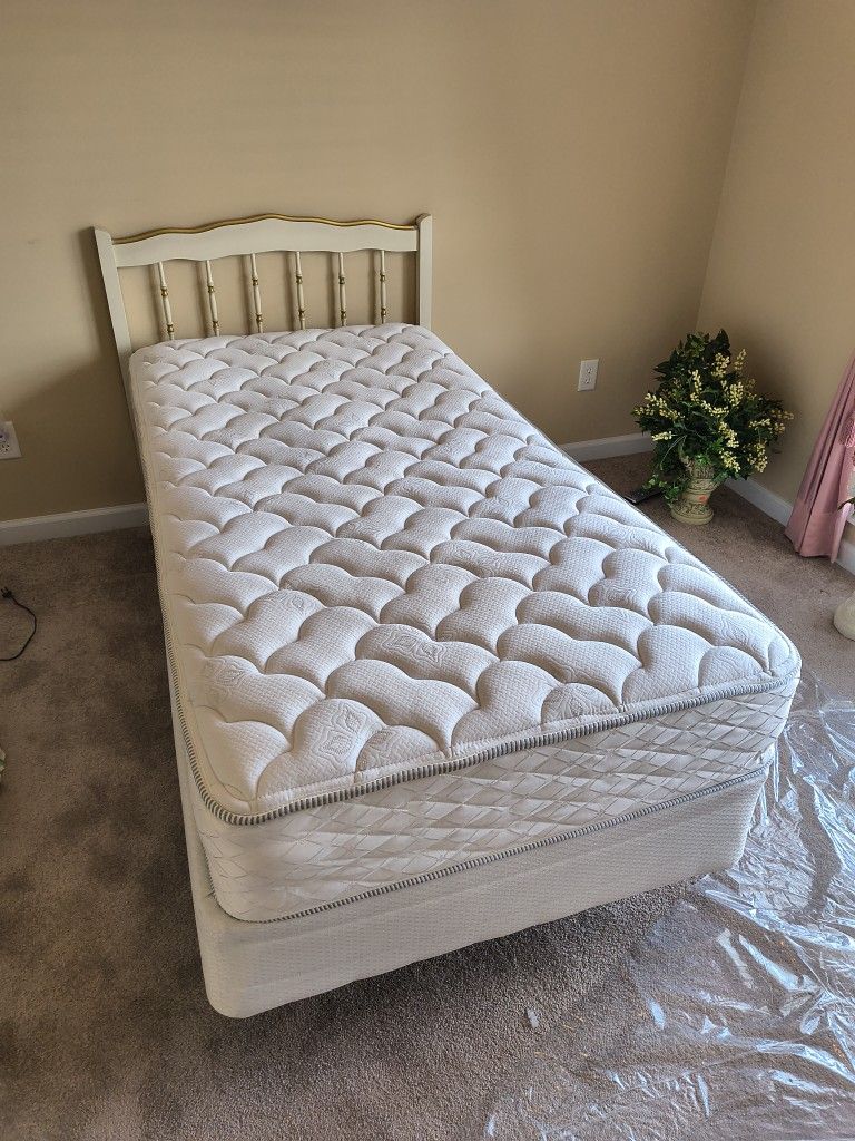 Twin bed complete with mattress and box springs for sale 🛏️
