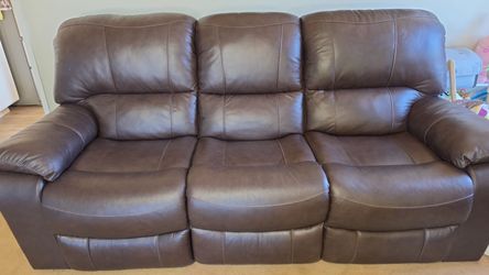 Leather power recliner sofa/couch set.