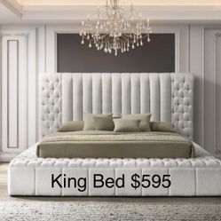 King Size White New Bed.  Very Nice Quality. Storage Around.  