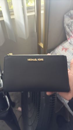 Michael Kors’s wallet