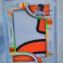 2023 Immaculate Collection Jackson Holliday Team Logo Patch Numbered 2/25