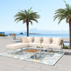 A full set of sofas and coffee tables is brand new