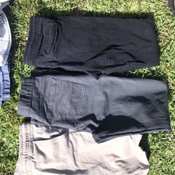Three pairs of boys size 18 pants and four pairs of boys sides eight teen shorts