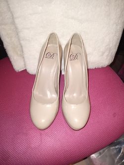 Beige closed toe high heels