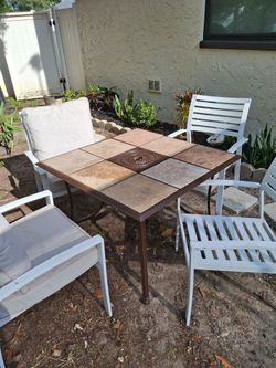 Slate umbrella tables with chairs