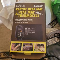 Reptile heat mat and thermostat.