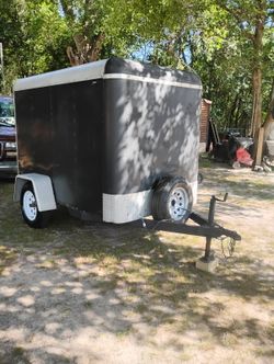 Box  in trailer black W/white trim