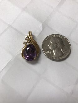 14 karat gold amethyst and diamond pendant